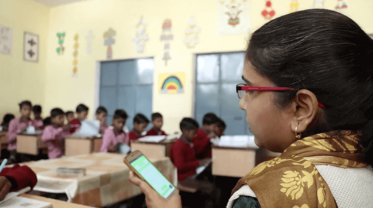 Teacher in K-8 classroom in Varanasi school using Class Saathi for quick assessments